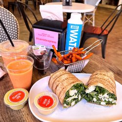 Carrot Express - Chicken Caesar Wrap with sweet potato fries
