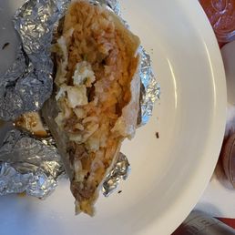 Their "asada" burrito filled with rice and beans. Where is the asada? Their "asada" burrito filled with rice and beans. Where is the asada?