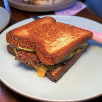 True Laurel - TL PATTY MELT: Griddled Dry-Aged Beef Ground in House, Melty Cheese, Caramelized Onion, Pickles, on Beef Fat Pain de Mie - Cocktail Bars Near Me - San Francisco, California True Laurel - TL PATTY MELT: Griddled Dry-Aged Beef Ground in House, Melty Cheese, Caramelized Onion, Pickles, on Beef Fat Pain de Mie - Cocktail Bars Near Me - San Francisco, California