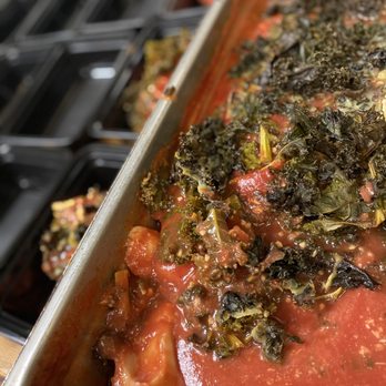 Elemental Table - a pan of cooked meat and vegetables - Food Delivery Services Near Me - Denver, Colorado Elemental Table - a pan of cooked meat and vegetables - Food Delivery Services Near Me - Denver, Colorado