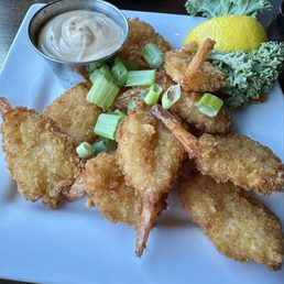 Coconut shrimp appetizer was crispy and sweet. Dipping sauce was delicious
