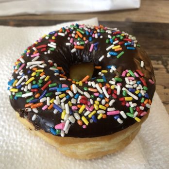 Rainbow Donuts - Chocolate Raised Doughnut with Rainbow Sprinkles - Bakeries Near Me - Berkeley, California Rainbow Donuts - Chocolate Raised Doughnut with Rainbow Sprinkles - Bakeries Near Me - Berkeley, California