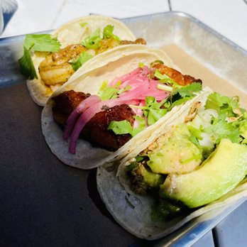 Bartaco - Orlando - #bartacosecret chili-lime shrimp taco (in the back), glazed pork belly (middle), salsa verde chicken (w/avacado) - Tacos Near Me - Orlando, Florida Bartaco - Orlando - #bartacosecret chili-lime shrimp taco (in the back), glazed pork belly (middle), salsa verde chicken (w/avacado) - Tacos Near Me - Orlando, Florida