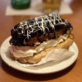 Fat Choy - Chocolate eclair (it is HUGE!) Not a heavy desert at all, but I recommend you share haha - New American Near Me - Las Vegas, Nevada Fat Choy - Chocolate eclair (it is HUGE!) Not a heavy desert at all, but I recommend you share haha - New American Near Me - Las Vegas, Nevada