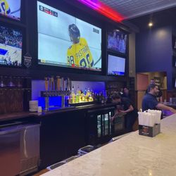 Big screen TVs are on every wall