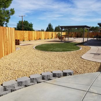 Competitive Lawn Services - a backyard with a wooden fence - Lawn Services Near Me - Hesperia, California Competitive Lawn Services - a backyard with a wooden fence - Lawn Services Near Me - Hesperia, California