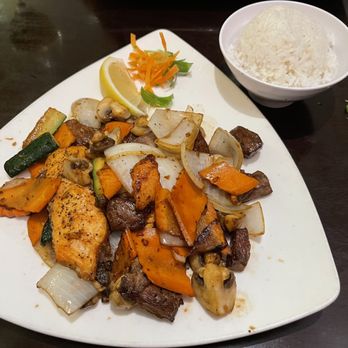 Edo Asian Fusion - Hibachi Combo. Steak and salmon with white rice. Both steak and salmon over cooked. Onions way undercooked. Rates 4/10. - Japanese Near Me - Brooklyn, New York
