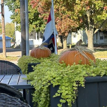 The Brickhouse Grind - pumpkins and a flag - Gift Shops Near Me - Fredericktown, Ohio