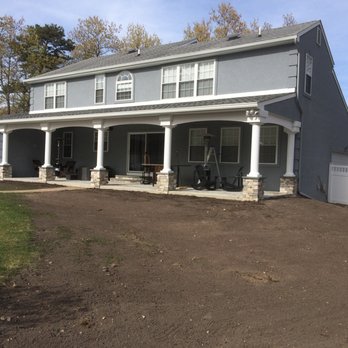 Jason Dibabbo Carpentry - Addition with azek  arches - Windows Installation Near Me