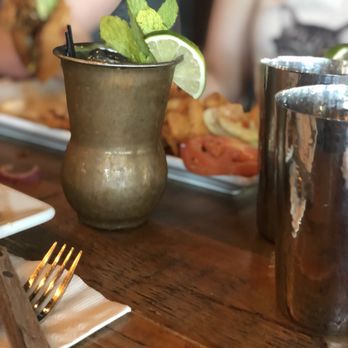 Queens Bully - Moscow mule with fried chicken sandwich in the back - Gastropubs Near Me - Forest Hills, New York Queens Bully - Moscow mule with fried chicken sandwich in the back - Gastropubs Near Me - Forest Hills, New York