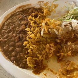 Attempted but gave up . The enchilada plate. Attempted but gave up . The enchilada plate.