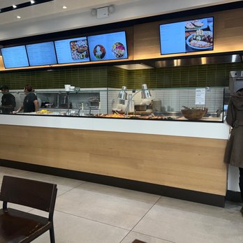 Fresh & Co - a man standing in front of the counter - Food Near Me - New York, New York Fresh & Co - a man standing in front of the counter - Food Near Me - New York, New York