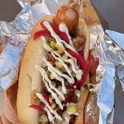 Krautworx Street Food - The Big Kahuna: All Beef Dawg, Pineapple Salsa, Lemon/Garlic Aioli, Pickled Onion, Steamed Bun!
