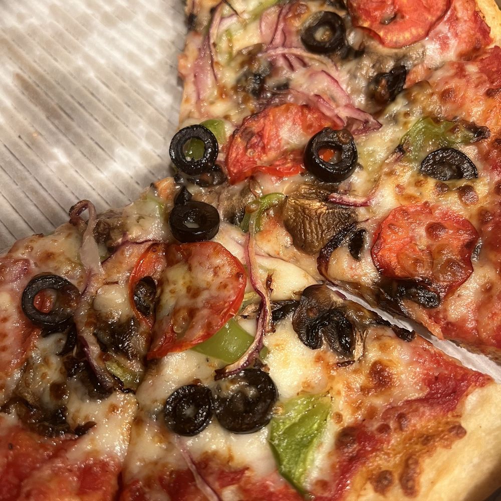 Red Apple Kitchen - Veggie pizza... 2 slice's missing because we couldn't wait - Pizza Near Me - San Leandro, California Red Apple Kitchen - Veggie pizza... 2 slice's missing because we couldn't wait - Pizza Near Me - San Leandro, California