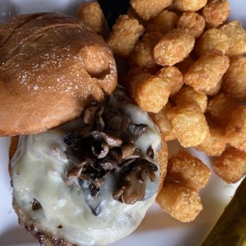 Ray J's American Grill - Mushroom Swiss burger and tator tots. - New American Near Me - Minneapolis, Minnesota Ray J's American Grill - Mushroom Swiss burger and tator tots. - New American Near Me - Minneapolis, Minnesota
