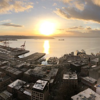 Smith Tower Observatory Bar - Sunset from the observation deck. - Cocktail Bars Near Me - Seattle, Washington Smith Tower Observatory Bar - Sunset from the observation deck. - Cocktail Bars Near Me - Seattle, Washington