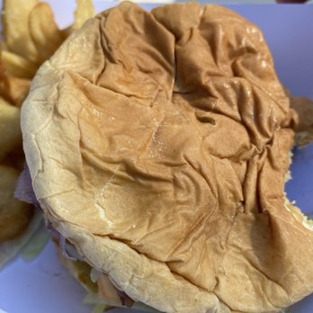 The Woodshed - This was my fiancés deluxe burger. - American Near Me - Manchester, Maine The Woodshed - This was my fiancés deluxe burger. - American Near Me - Manchester, Maine