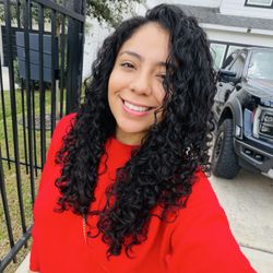 Michael Saldana Salon In Midtown - Long layered curly haircut.