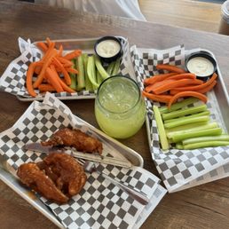 BBQ Honey Tenders , Celery and Carrot sticks , Pineapple Prosecco drink