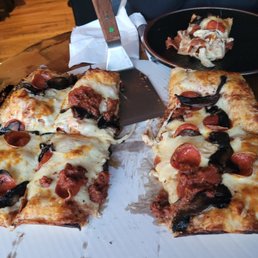 Peperoni and mushroom Detroit style pizzs