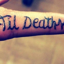 A Touch of Color Tattoo & Body Piercing - My first finger tat and Chris did amazing