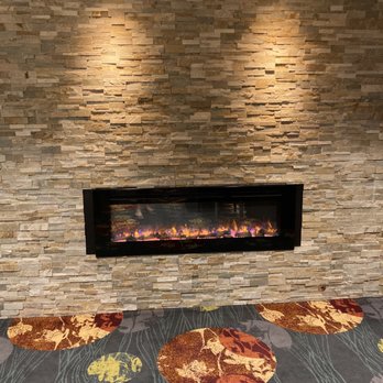 Courtyard by Marriott Buffalo Amherst/University - Fireplace in lobby - Hotels Near Me - Buffalo, New York Courtyard by Marriott Buffalo Amherst/University - Fireplace in lobby - Hotels Near Me - Buffalo, New York