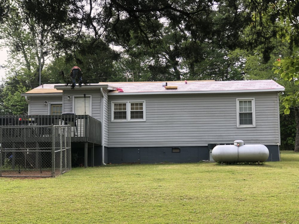 Slide of Ray's Roofing & Restoration
