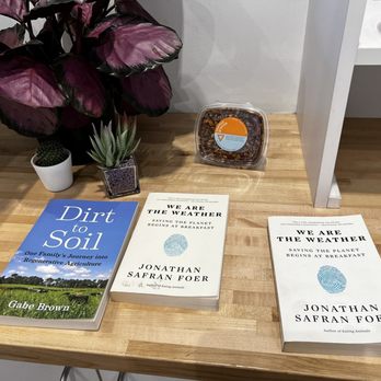 Vibe Organic Kitchen & Juice - Inspiring books on display - Juice Bars & Smoothies Near Me - Dana Point, California