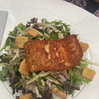 Brewster's New Buffalo - Salad Seared salmon, turkish apricots, almond, chèvre, cherry tomato and honey dijon vinaigrette on mixed greens - Italian Near Me - New Buffalo, Michigan Brewster's New Buffalo - Salad Seared salmon, turkish apricots, almond, chèvre, cherry tomato and honey dijon vinaigrette on mixed greens - Italian Near Me - New Buffalo, Michigan