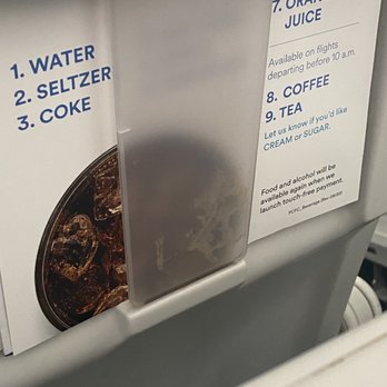 Alaska Airlines - Disgusting plastic covered in something looks like PUKE? Mac n cheese sauce? - Airlines Near Me - Seattle, Washington
