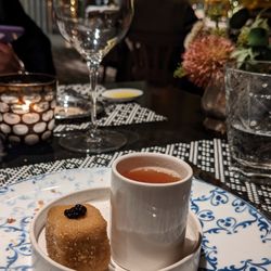 Hispania - Amuse bouche on the house!  A condensed tasty chicken soup 'shot' with mushroom truffle croquette