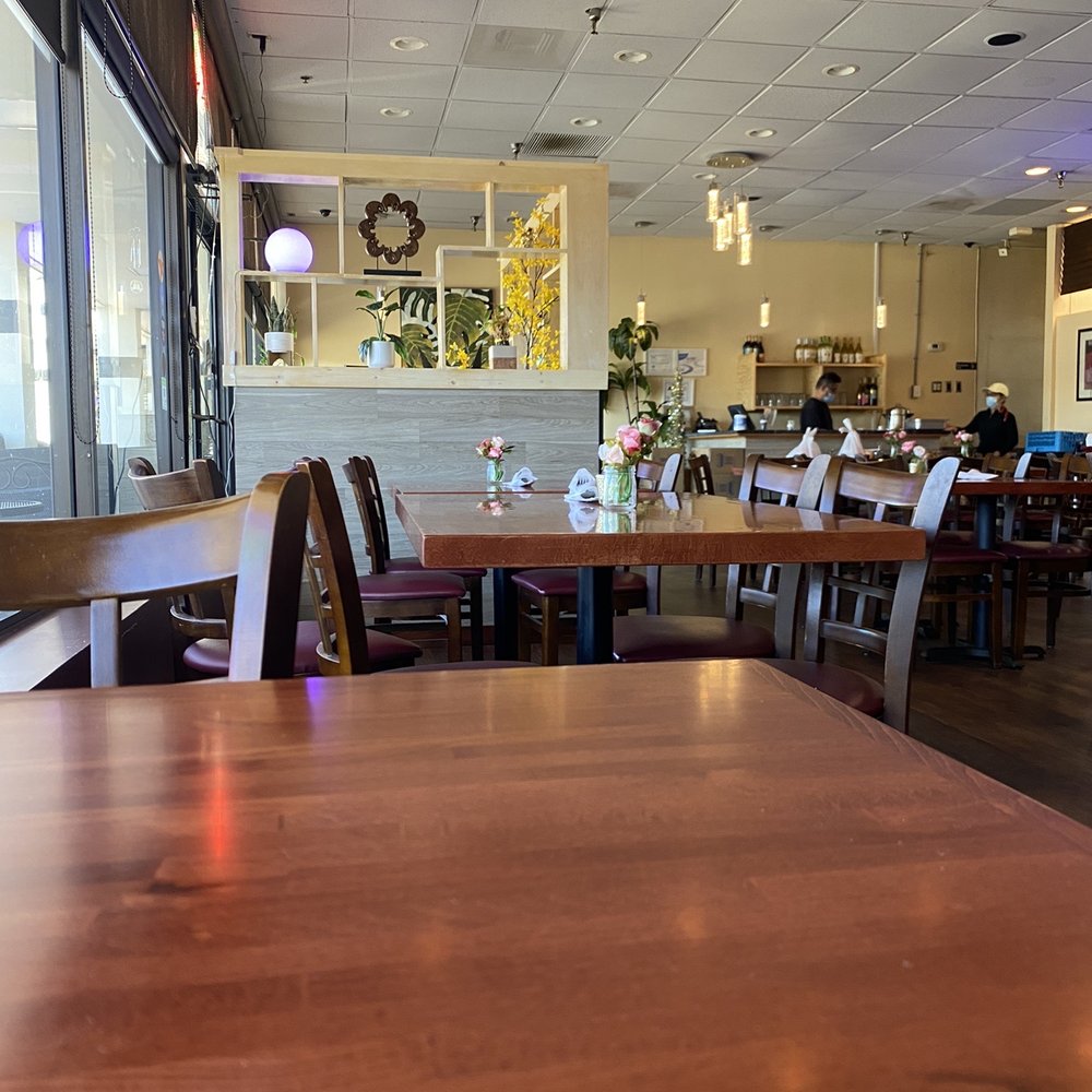 Twisted Noodles - a table and chairs in a restaurant - Thai Near Me - Durham, North Carolina Twisted Noodles - a table and chairs in a restaurant - Thai Near Me - Durham, North Carolina