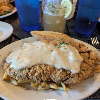Cypress Grill - One of the best (and underrated) chicken fried steaks in the city! The drink is the Peach, Don't Kill My Vibe. - American Near Me - Austin, Texas