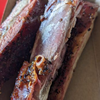 Porky's Belly BBQ - This was one of the 3 bones I got in my 1/2 lb order. - Barbeque Near Me - Montgomery, Texas