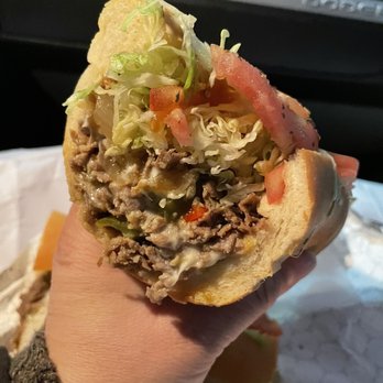 City Steaks - Cheesesteak with American cheese, fried onions, sweet peppers, lettuce, & tomato - Sandwiches Near Me - Burlington, New Jersey City Steaks - Cheesesteak with American cheese, fried onions, sweet peppers, lettuce, & tomato - Sandwiches Near Me - Burlington, New Jersey