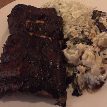 Earls Kitchen + Bar - My own delicious half portion of ribs with potato salad and cole slaw - New American Near Me - Orlando, Florida