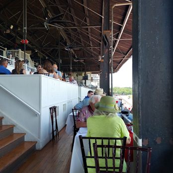 sachin and babi light blue dress Decoding the Saratoga Race Course dress code main image 1