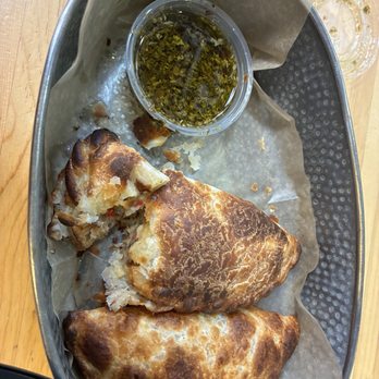Lazo Empanadas - 16Th Mall - Mushroom and BBQ Chicken Empanadas with Chimichurri (picture taken after I broke one open) - Empanadas Near Me - Denver, Colorado Lazo Empanadas - 16Th Mall - Mushroom and BBQ Chicken Empanadas with Chimichurri (picture taken after I broke one open) - Empanadas Near Me - Denver, Colorado