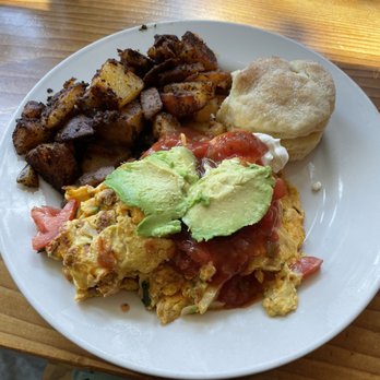 Poach 503 - Baja Scramble with chorizo, home made biscuit, and potatoes.  All SO good. - Breakfast & Brunch Near Me - Manzanita, Oregon