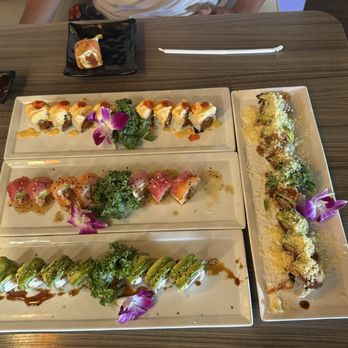Oji Sushi & Bar - Firecracker Roll at the top $7.62 Candy Roll below it $16.95 Caterpillar Roll $8.25 Crunch Dragon Roll to the right $18.95 - Sushi Bars Near Me - Costa Mesa, California Oji Sushi & Bar - Firecracker Roll at the top $7.62 Candy Roll below it $16.95 Caterpillar Roll $8.25 Crunch Dragon Roll to the right $18.95 - Sushi Bars Near Me - Costa Mesa, California