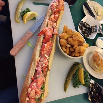 Bull N' Claw - 2' lobster roll, fried onion petals - Seafood Near Me - Wells, Maine Bull N' Claw - 2' lobster roll, fried onion petals - Seafood Near Me - Wells, Maine