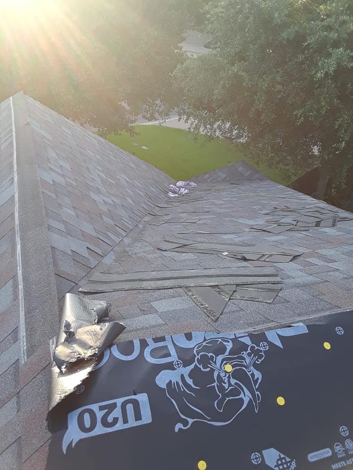 Slide of Junior Roofing & Repair