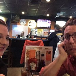 a man and a woman sitting at a table a man and a woman sitting at a table