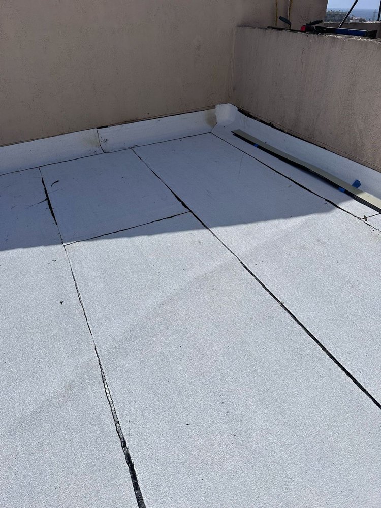 Slide of Tecun’s Roofing