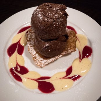 Huhu Cafe - Dark chocolate and orange mousse, brandysnap basket, raspberry coulis. ($12) - Coffee & Tea Near Me - Hangatiki, WKO Huhu Cafe - Dark chocolate and orange mousse, brandysnap basket, raspberry coulis. ($12) - Coffee & Tea Near Me - Hangatiki, WKO