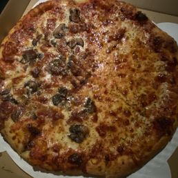 Half cheese and half bacon and mushrooms.