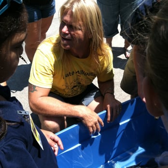 Zam's Swamp Tour - Deigo lets the kids hold baby alligators.... - Tours Near Me - Thibodaux, Louisiana