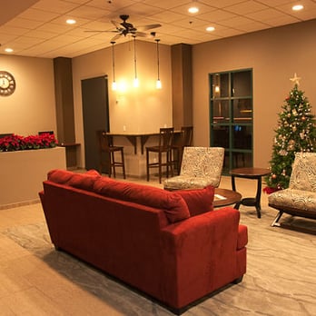 Grace Builders, Inc. - a living room with a christmas tree - General Contractors Near Me - La Mesa, California Grace Builders, Inc. - a living room with a christmas tree - General Contractors Near Me - La Mesa, California