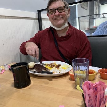 Biscuits Cafe - Art loving his steak & eggs - Cafes Near Me - Surprise, Arizona
