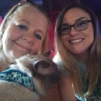 Rockefellas Bar - Sarah is on right she will serve you a cold one. Middle is piglet my owner. I am on left is myself Lindi. - Bars Near Me - Corona, California